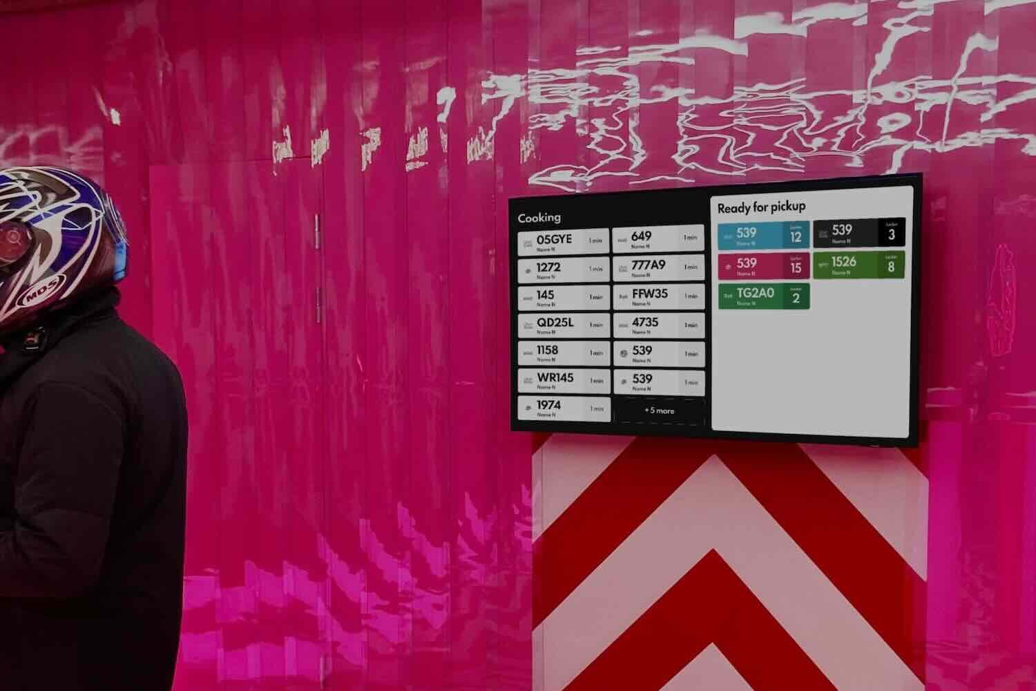 Delivery driver waiting for the customer order to be ready for pickup.