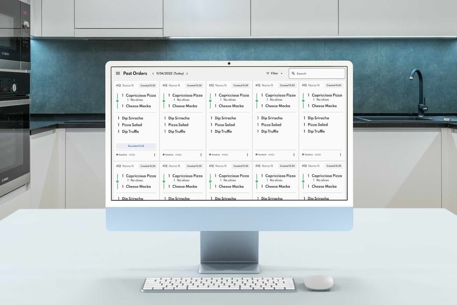 Kitchen staff using KitchenOS software to streamline ghost kitchen operations